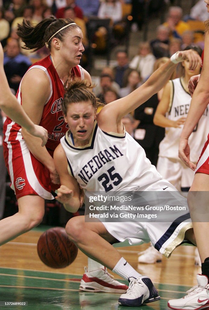 (031207 Boston, MA) Central Catholic's (24) Melissa Lucas, left, takes down Needham's Cerie Mosgrove as CC defeated Needham 61-42 in the Division 1 state semifinal game at TD Banknorth Garden on Monday, March 12, 2007. Staff photo by Matthew We