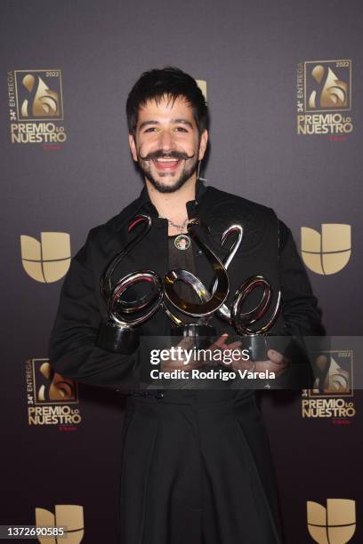 Camilo poses with his awards during Univision's 34th Edition Of Premio Lo Nuestro a la Música Latina at FTX Arena on February 24, 2022 in Miami,...