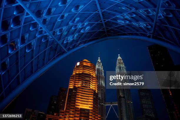 kuala lumper skyline at night - malaysia skyline stock pictures, royalty-free photos & images