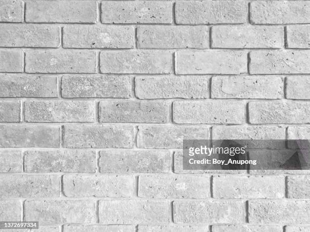 white brick wall textured and pattern for background usage as a backdrop design. - brick wall close up stock pictures, royalty-free photos & images