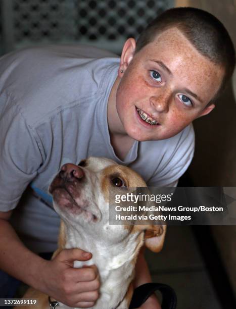 Carmen Scoppettuolo is seen with his dog Bella, March 23, 2013. His friend, Brandon Marchetti, was mauled by 2 dogs in Revere Thursday. One of the...
