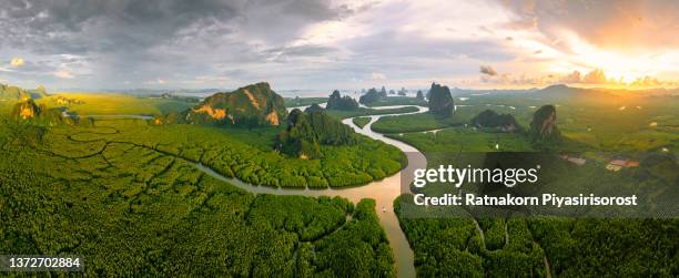 panorama view of sametnangshe, view of mountains in phang nga bay with mangrove forest in andaman sea with evening twilight sky, travel destination in phang nga, thailand. south east asia - seascape sunset stock pictures, royalty-free photos & images