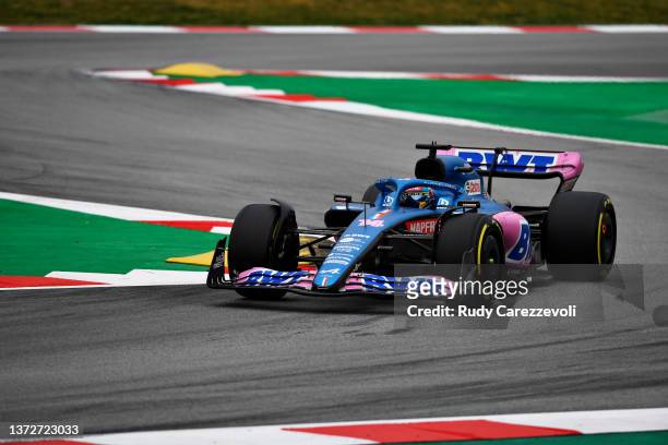 Fernando Alonso of Spain driving the Alpine F1 A522 Renault during Day Three of F1 Testing at Circuit de Barcelona-Catalunya on February 25, 2022 in...