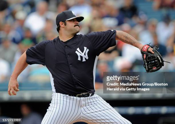 New York Yankees relief pitcher Joba Chamberlain throws against the Boston Red Sox at George M. Steinbrenner Field in Tampa, Florida on Wednesday,...