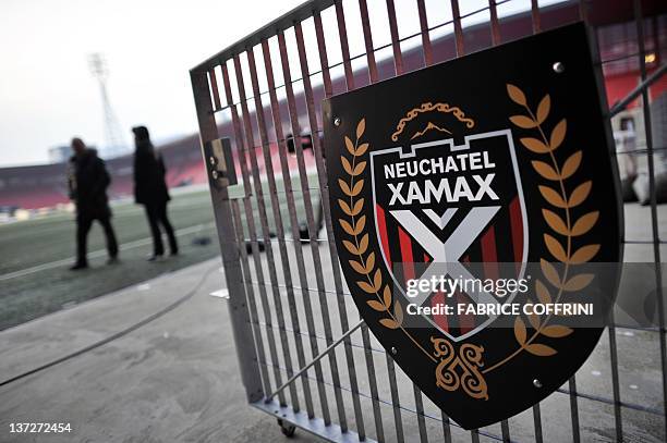 Picture taken on January 18, 2012 shows the logo of Neuchatel Xamax football club at the entrance of the Maladiere Stadium in Neuchatel. The Swiss...