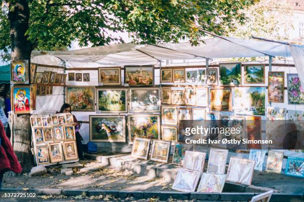 paintings for sale at a flea market in kyiv, ukraine - painted image paintings art stock pictures, royalty-free photos & images