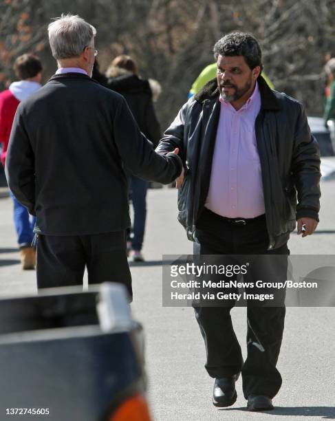 St. Johnsbury, VT - Actor and area resident Luis Guzman shakes hands as he walks to the memorial service for Melissa Jenkins at St. Johnsbury...