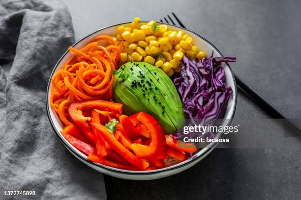 veggie bowl with avocado, carrots. red pepper, red cabbage, corn and blueberries - low carb diet stock pictures, royalty-free photos & images