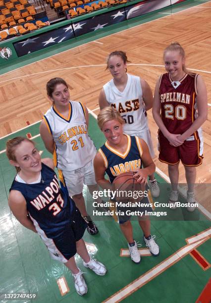 All-Scholastic Girls Basketball players Jackie Powers , Liz Tindal , Kelsey Simmonds , Lauren Hartnett , and Sarah Fuller stand under the basket at...