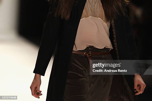 Model walks the runway at the Rebekka Ruetz Autumn/Winter 2012 fashion show during Mercedes-Benz Fashion Week Berlin at the Brandenburg Gate on...