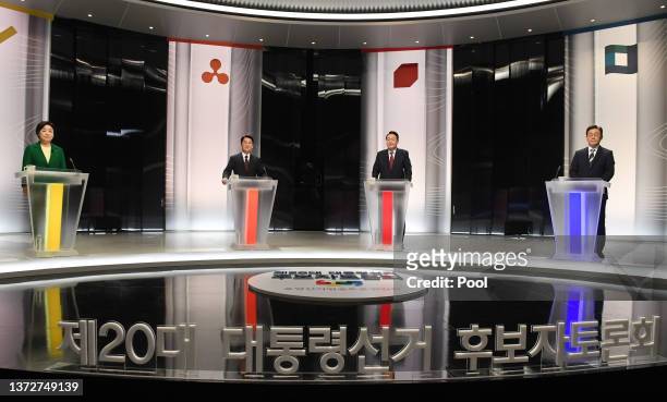 South Korean presidential candidates, Sim Sang-jung of the opposition Justice Party, Ahn Cheol-soo of the opposition People's Party, Yoon Suk-yeol of...