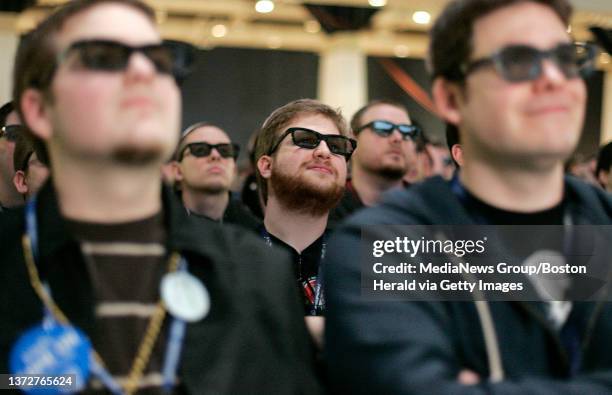 Gaming fans with 3D glasses on watch a demonstration of of a new 3D graphics cards and chip from Nvidia inside the Main Theater of the PAX East Video...