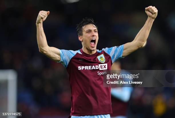 Jack Cork of Burnley celebrates after the Premier League match between Burnley and Tottenham Hotspur at Turf Moor on February 23, 2022 in Burnley,...