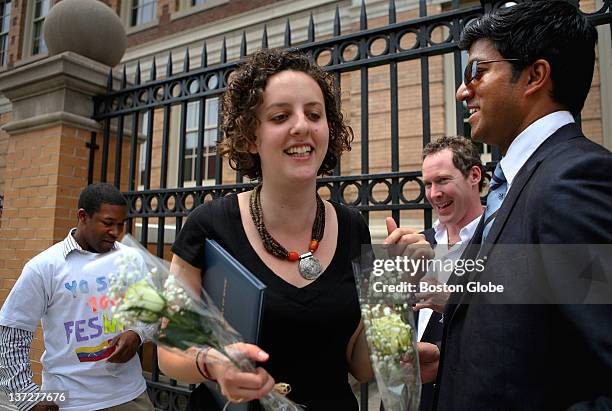 From left to right: Abreu Fellows Dantes Rameau, Rebecca Levi, David Malek and Jonathan Govias linger outside following a certificate ceremony at the...