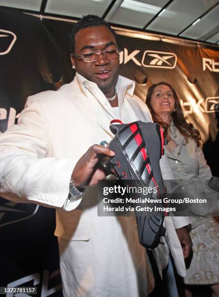 Celebs come out for Reebok. David Ortiz and his wife Tiffany admire the new baseball cleat. Tuesday, April 10, 2007. Staff photo by John Wilcox