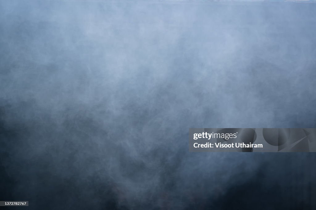 Light smoke texture on a dark background,Grey Smoke Overlay Texture movement.