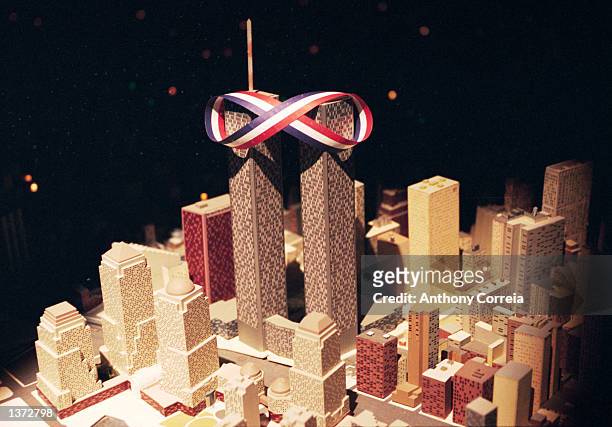 Miniature version of the World Trade Center's Twin Towers is shown with a red, white and blue ribbon at Queens Museum December 17, 2001 in Flushing...
