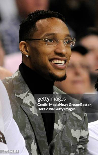 Boston Celtics guard Evan Turner sits on the bench in street clothes as the Celtics take on the New Orleans Pelicans during the second quarter of a...