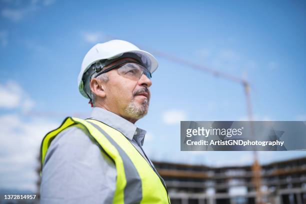 portrait of confident and successful senior architect. - construction worker stock pictures, royalty-free photos & images