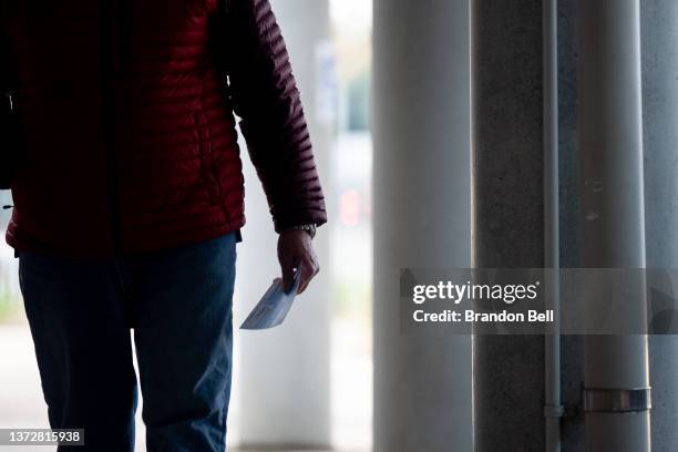 Person prepares to cast their ballot at the Metropolitan-Multi Service Center on February 25, 2022 in Houston, Texas. People across the Houston...