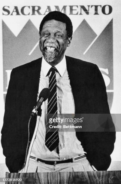 Bill Russell talks to reporters at a news conference where it was announced that Russell will become head coach of the Sacremento Kings under a seven...