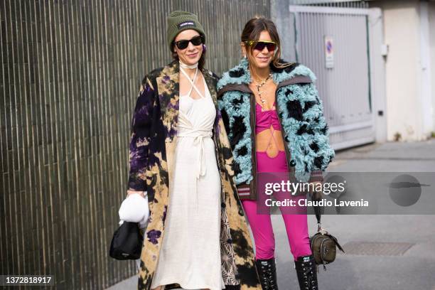 Annacarla e Simona poses ahead of the XX fashion show wearing XX during the Milan Fashion Week Fall/Winter 2022/2023 on February 24, 2022 in Milan,...