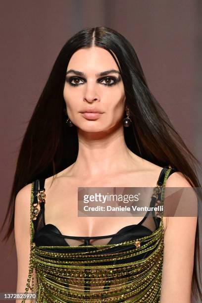 Emily Ratajkowski walks the runway at the Versace fashion show during the Milan Fashion Week Fall/Winter 2022/2023 on February 25, 2022 in Milan,...