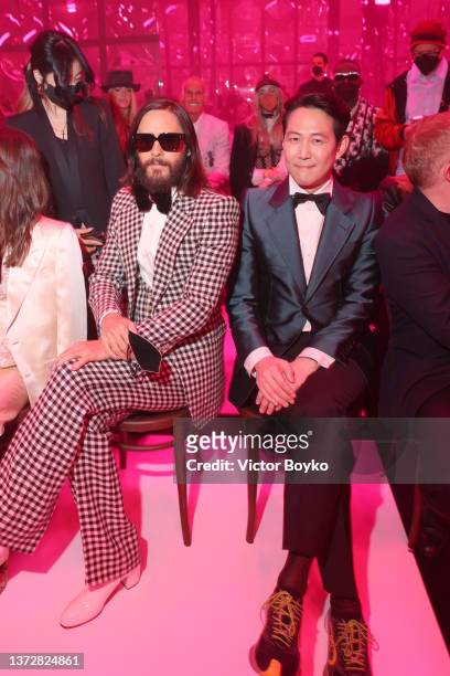 Jared Leto and Jungjae Lee are seen at the Gucci show during Milan Fashion Week Fall/Winter 2022/23 on February 25, 2022 in Milan, Italy.