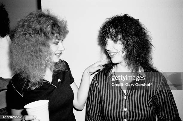 View of American Rock musicians and sisters Nancy and Ann Wilson, both of the group Heart, backstage at Radio City Music Hall, New York, New York,...