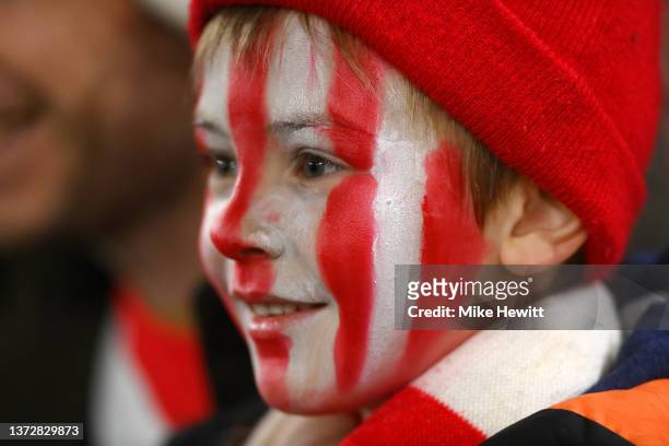 Young Southampton fan looks on prior to the Premier League match between Southampton and Norwich City at St Mary's Stadium on February 25, 2022 in...