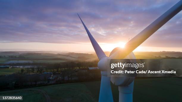 scenic view of windmill at sunrise - south west england fotografías e imágenes de stock