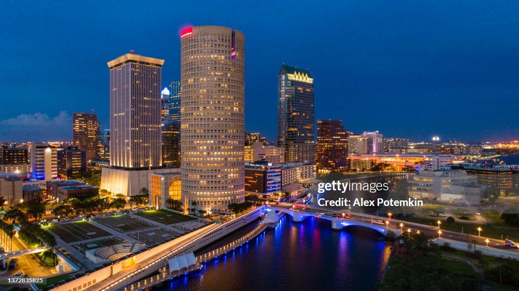 Aerial view of the illuminated Downtown Tampa Skyline in the night.