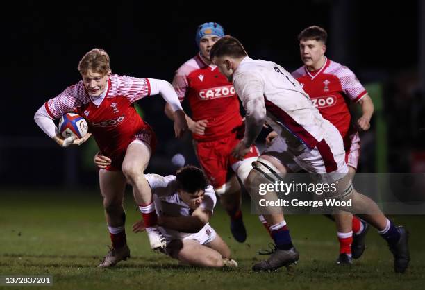 Harri Houston of Wales makes a break during the Under-20 Six Nations match between England U20 and Wales U20 at Castle Park on February 25, 2022 in...