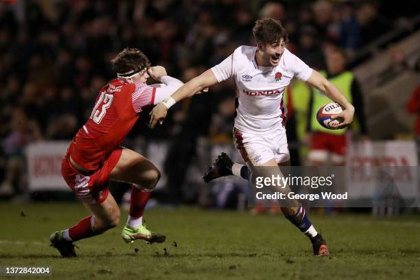 Ethan Grayson of England breaks away from wal1 during the Under-20 Six Nations match between England U20 and Wales U20 at Castle Park on February 25,...