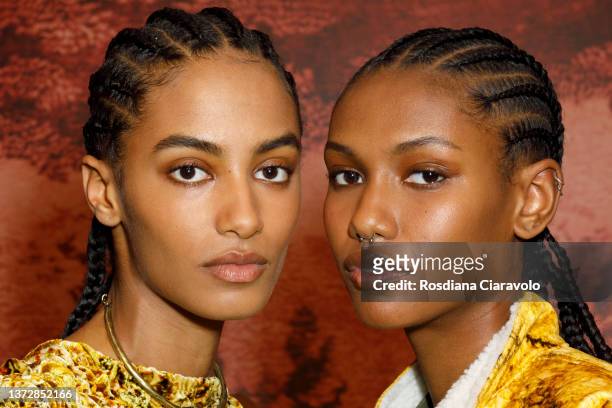 Models Sacha Quenby and Eden Joi pose backstage of the Etro fashion show during the Milan Fashion Week Fall/Winter 2022/2023 on February 25, 2022 in...