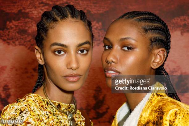Models Sacha Quenby and Eden Joi pose backstage of the Etro fashion show during the Milan Fashion Week Fall/Winter 2022/2023 on February 25, 2022 in...
