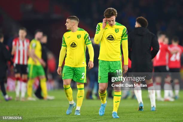 Kieran Dowell and Max Aarons of Norwich City look dejected following their side's defeat in the Premier League match between Southampton and Norwich...