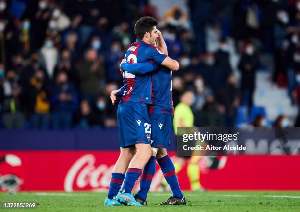 Gonzalo Melero of Levante UD celebrates with his teammates Jorge Miramon of Levante UD after scoring his team's third goal during the LaLiga...