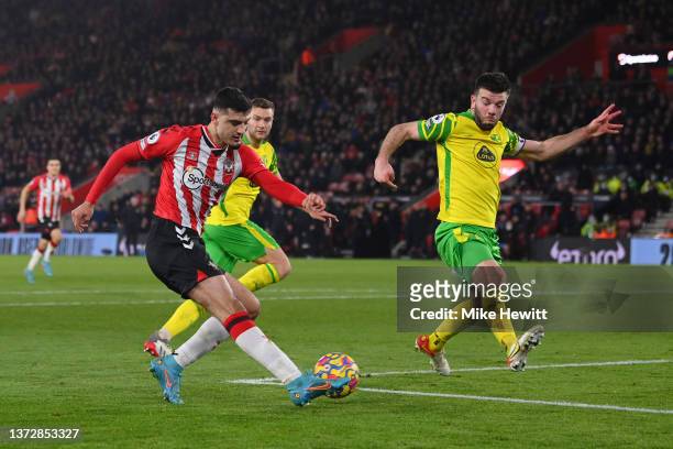 Armando Broja of Southampton has a shot blocked by Grant Hanley of Norwich City during the Premier League match between Southampton and Norwich City...