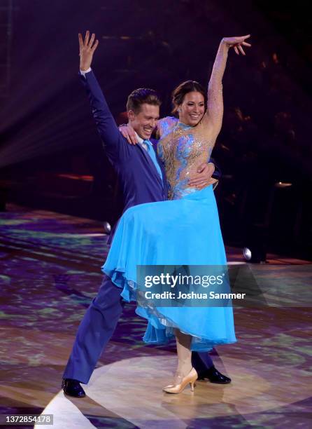 Caroline Bosbach and Valentin Lusin perform on stage during the 1st show of the 15th season of the television competition show "Let's Dance" at MMC...