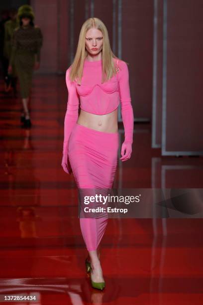 Model walks the runway at the Versace fashion show during the Milan Fashion Week Fall/Winter 2022/2023 on February 25, 2022 in Milan, Italy.