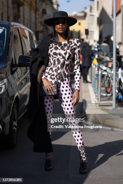 Guest is seen ahead of the Etro fashion show wearing a leopard polka dot onsie during the Milan Fashion Week Fall/Winter 2022/2023 on February 25,...