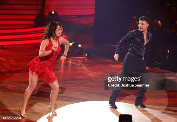 Mike Singer and Christina Luft perform on stage during the 1st show of the 15th season of the television competition show "Let's Dance" at MMC...