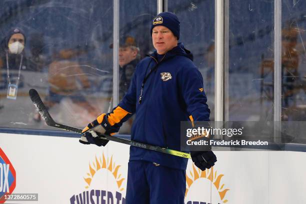 Head coach John Hynes of the Nashville Predators coaches during a practice session prior to the 2022 Navy Federal Credit Union NHL Stadium Series at...