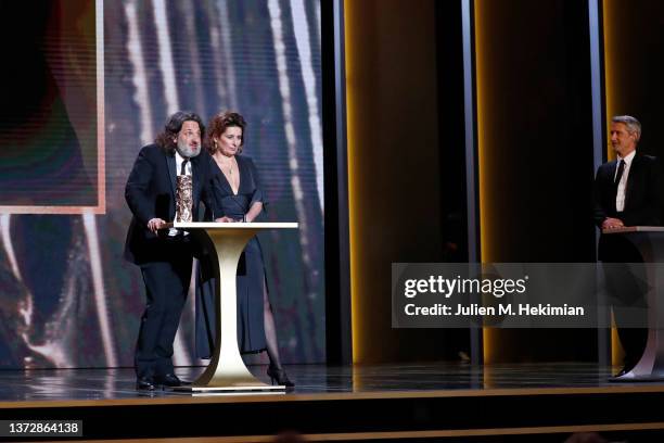 Olivier Delbosc and Sidonie Dumas receive, on the name of Xavier Giannoli, the best film Cesar award for the movie “Illusions Perdues” during the...