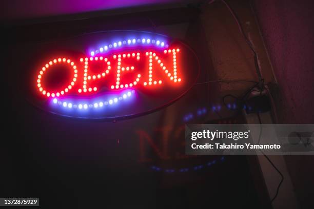 an open sign a restaurant - store opening stock-fotos und bilder