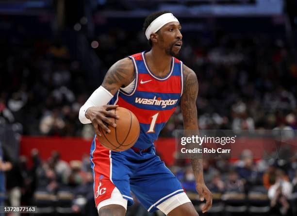 Kentavious Caldwell-Pope of the Washington Wizards dribbles during the third quarter nio Spurs at Capital One Arena on February 25, 2022 in...