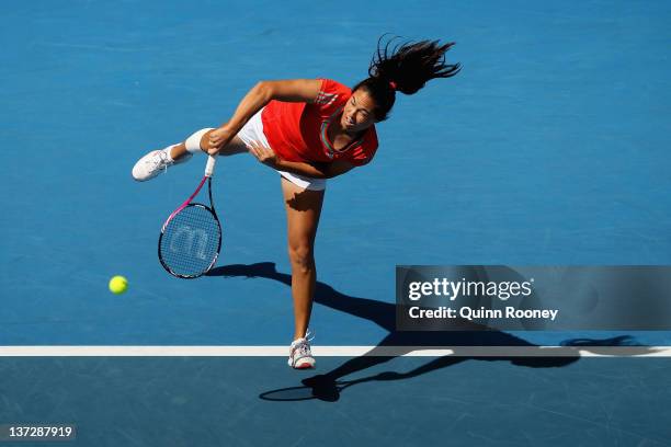 Jamie Hampton of the United States serves in her second round match against Maria Sharapova of Russia during day four of the 2012 Australian Open at...