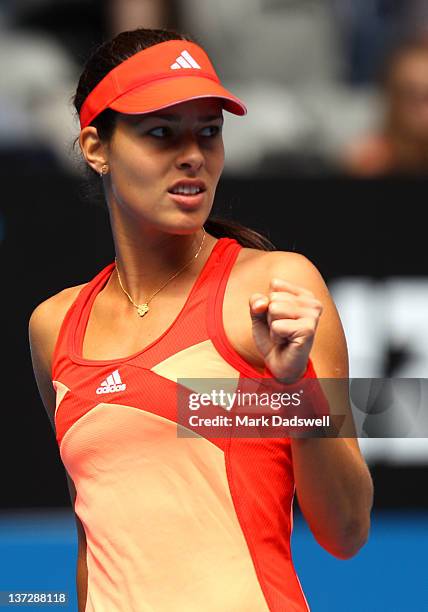 Ana Ivanovic of Serbia celebrates winning a point during her second round match against Michaella Krajicek of the Netherlands during day four of the...