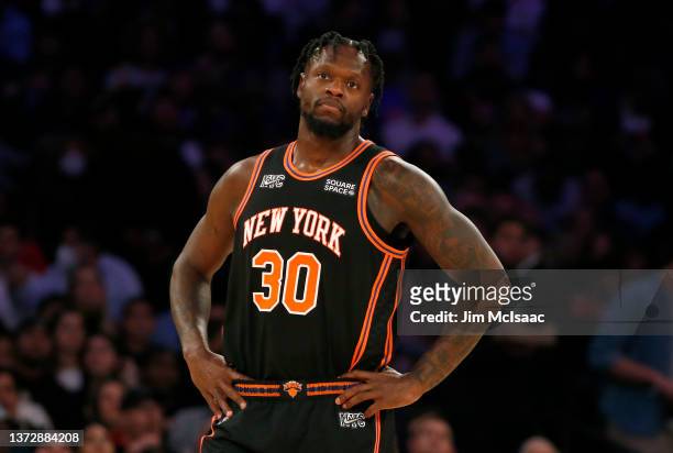 Julius Randle of the New York Knicks looks on during a time out in the second half of a game against the Miami Heat at Madison Square Garden on...